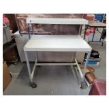 Metal desk on casters. 42x36x24