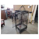 Bird cage on casters and bird books. 55x24x24.