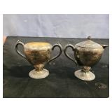 Silver plated creamer and sugar bowl set.