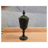 Black glass urn. 15ï¿½x6.