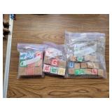 Wooden letter blocks in 3 bags. Two sizes.