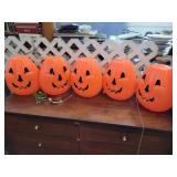 Vintage plastic light up pumpkins. 12x10x8. All
