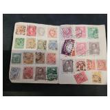 Postage stamp collection book with stamps