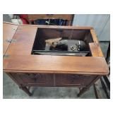 Kenmore sewing machine in wood cabinet. Untested.