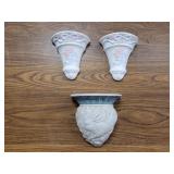 Ceramic wall hangings.  Vases and shelf.
