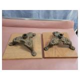Brass flag stands on wood bases. 4x10 each.