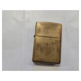 Zippo lighter in gold tone