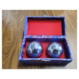 Silver plated Chinese stress relieving ball in