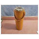 Knitting needles in holder.
