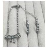Bow bracelet & hoop earrings with rhinestones