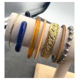 Collection of Bracelets. Small gold chain is 14kGP