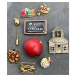 Collection of teacher pins