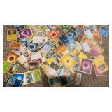 Collection of Pokémon cards. About 100 cards