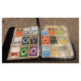 Pages of Pokémon  cards in binder