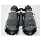 Vintage black binoculars, worn edges