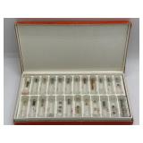 Assorted watch crowns in case