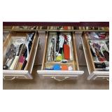 Kitchen Gadgets In Three Drawers