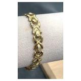 14k Xs & Os Bracelet. 7".  11g