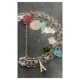 S.S. Charm Bracelet w/ SS charms. 37.6g