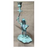 This is a whimsical bronze figural candlestick