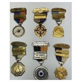 These are vintage competitive shooting medals,