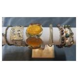 Collection of bracelets. Mostly beaded.  Stamped