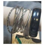 Avon black luminesque bangle and silvertone
