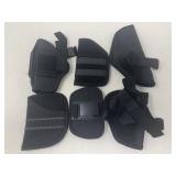 Assortment of gun holsters