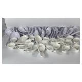 white Asian-style soup spoons.
