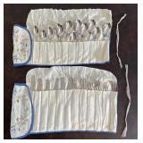 Stainless Flatware Pieces In Rolled Cloth Wraps