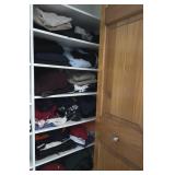 Assorted Menï¿½s & Womenï¿½s Clothing in Closet