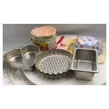 assorted baking and cake decorating supplies.