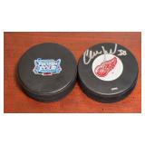 Signed Redwings Puck & Frozen 4 Puck