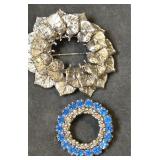 Pair of brooches