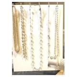 Pearl/beaded necklaces. Pearl like  bracelets
