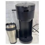 Single serve coffee maker with a to go cup