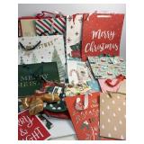 Lot of Christmas gift bags various sizes