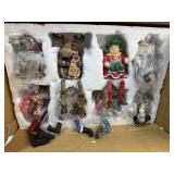 8 piece holiday sitters. New in box