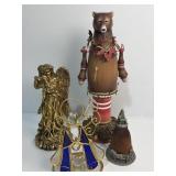 Various figurines with gold angel