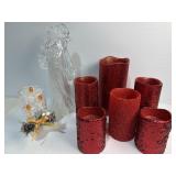 Battery operated Santa and red candles and wall