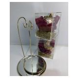 Two ornament display hooks and two ornaments