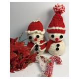 Two knit snowmen, faux poinsettias and vintage