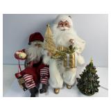 Two sitting Santaï¿½s (14ï¿½)  and mini ceramic tree