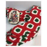 8 knitted stockings (18ï¿½ long)  and tin