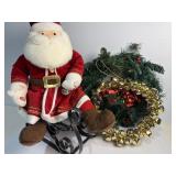 Plush Santa with sleigh and 2 wreathes