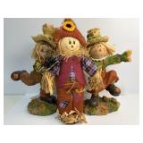 Three scarecrow figurines -12ï¿½ tall