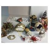 Various Christmas ornaments including lighthouse
