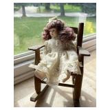 Doll in Lace Dress with Wooden Rocking Chair