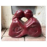 Red Embracing Couple Sculpture