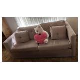 Caster Sleeper Sofa in mauve tone